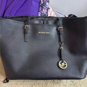 Michael Kors Black Tote with Gold Accents